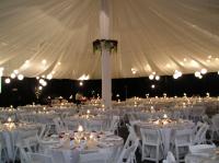 Beautiful Wedding set-up on a tennis court.  Design Events can truly change your venue into your dream wedding.  Add some ceiling voile, lantern lighting and decor